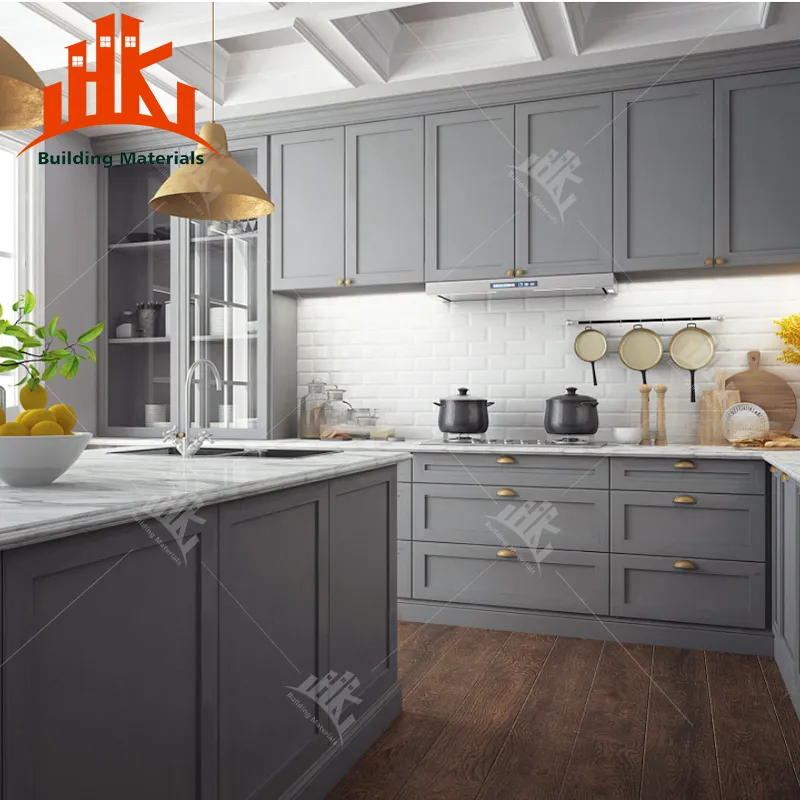 Modern kitchen with grey cabinets and a marble island