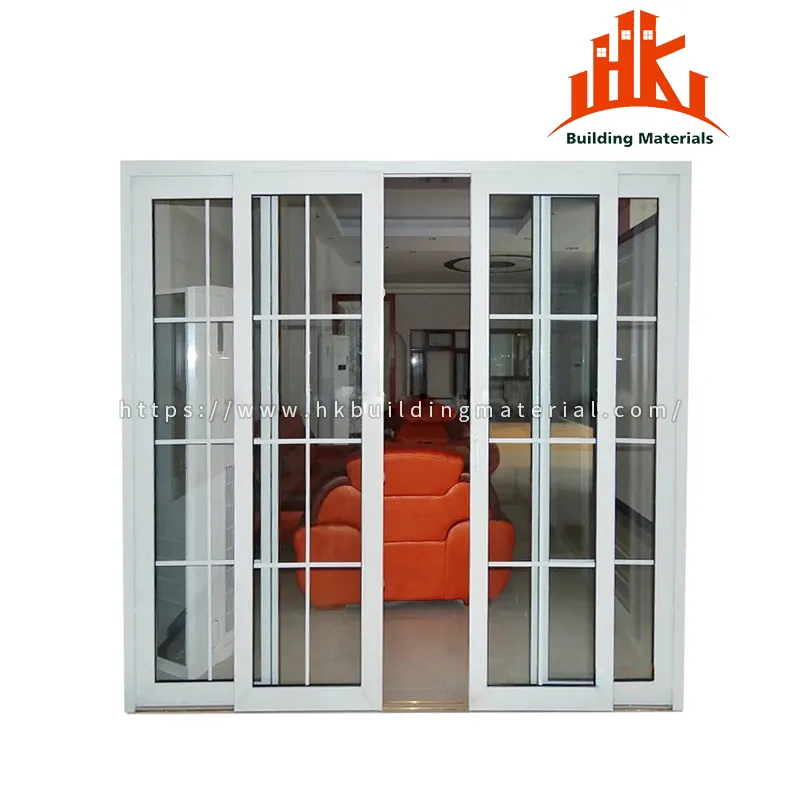 White sliding glass door with grid muntins looking into a room with an orange sofa