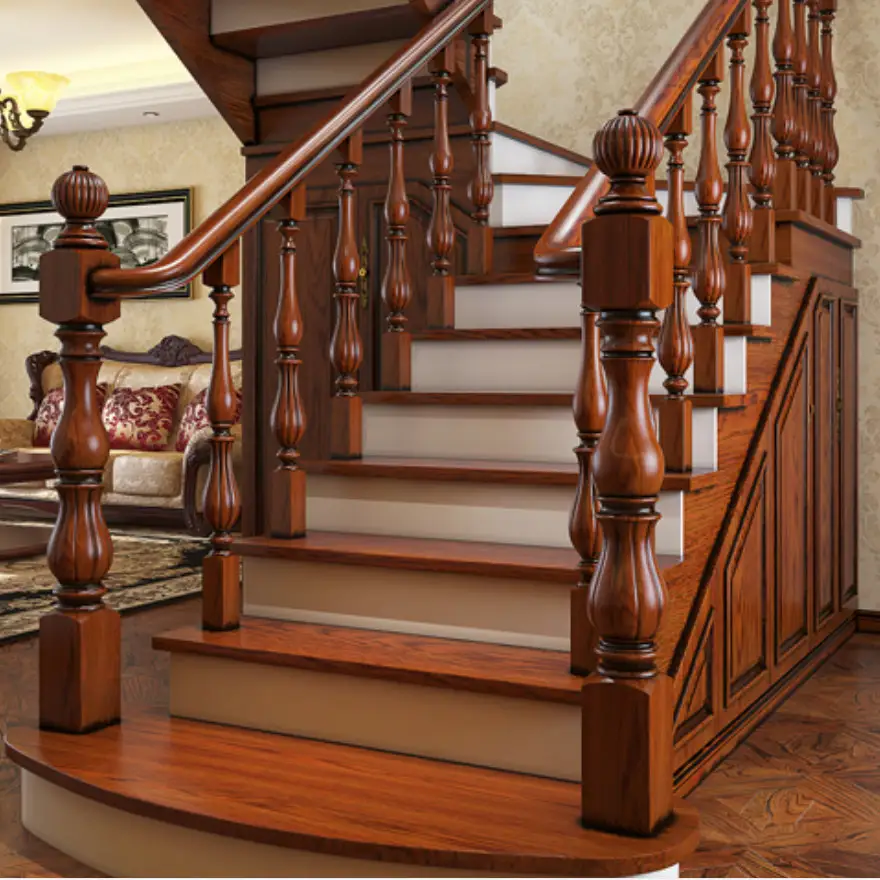 Polished wooden staircase with ornate carved newel posts and railings