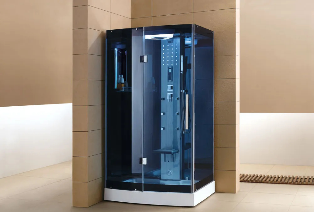 A modern corner shower enclosure with dark tinted glass and an integrated control panel.