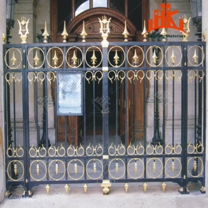 Ornate black and gold wrought iron gate featuring fleur-de-lis designs and spear tips