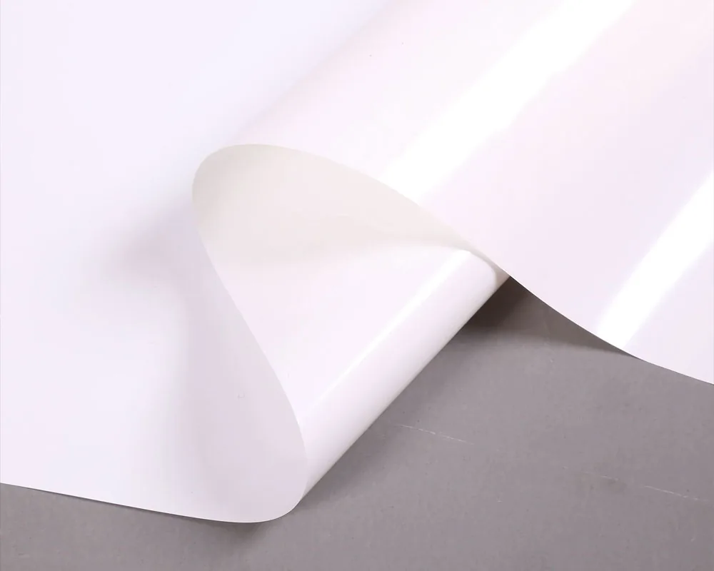 Roll of fluoropolymer front film for lightweight PV modules