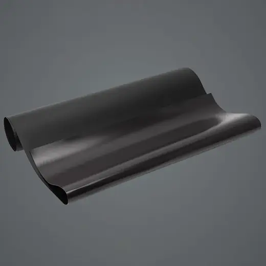 Black backsheet film with a white outer surface, partly rolled