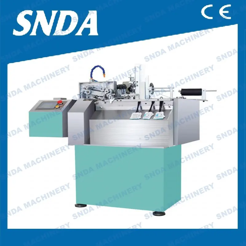 Automatic Tag Threading Machine