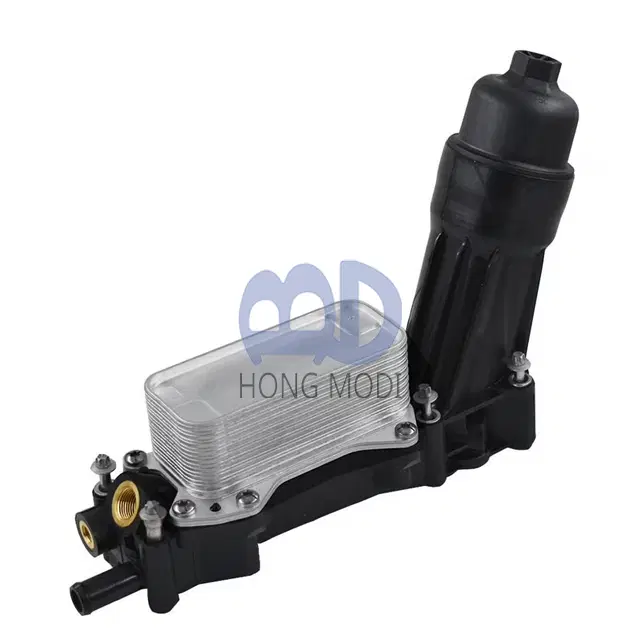 Oil filter adapter housing with cooler, 68105583AB, suitable for Chrysler, Dodge, and Jeep 3.6-liter engines.