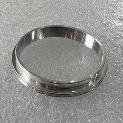 Machined aluminium connect ring with a stepped bore and an external retaining groove