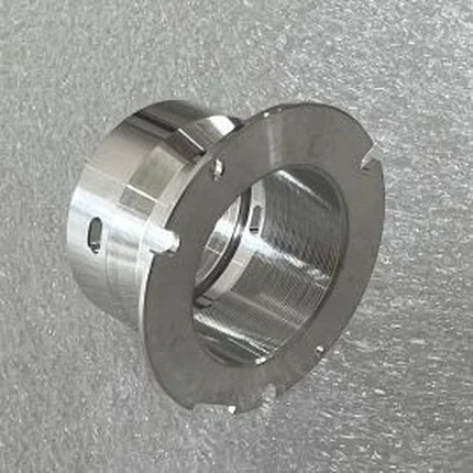 Machined aluminium tube connector with a flanged shoulder stepped spigot and a cross hole