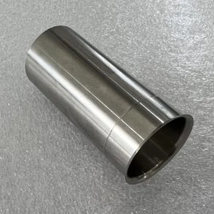 Turned stainless steel precision bushing with a finished bore and chamfered ends
