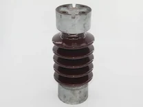 Brown glazed porcelain station post insulator with ribbed sheds and cast