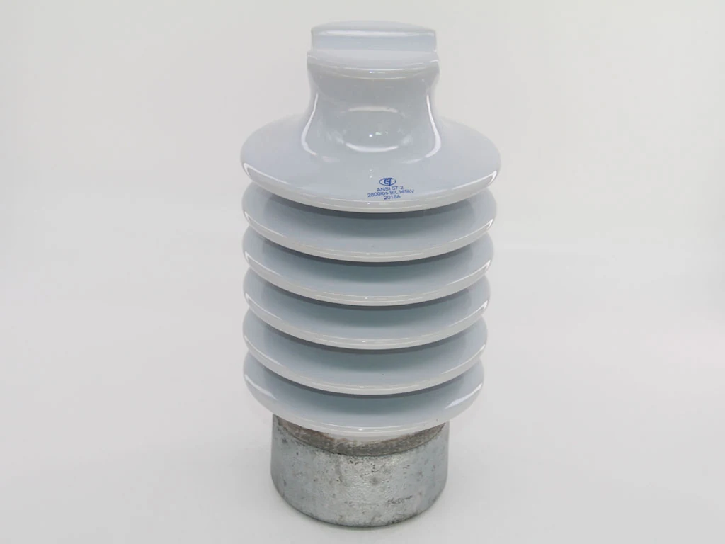Brown glazed porcelain ANSI 57-2 line post insulator with galvanized mounting cap and base