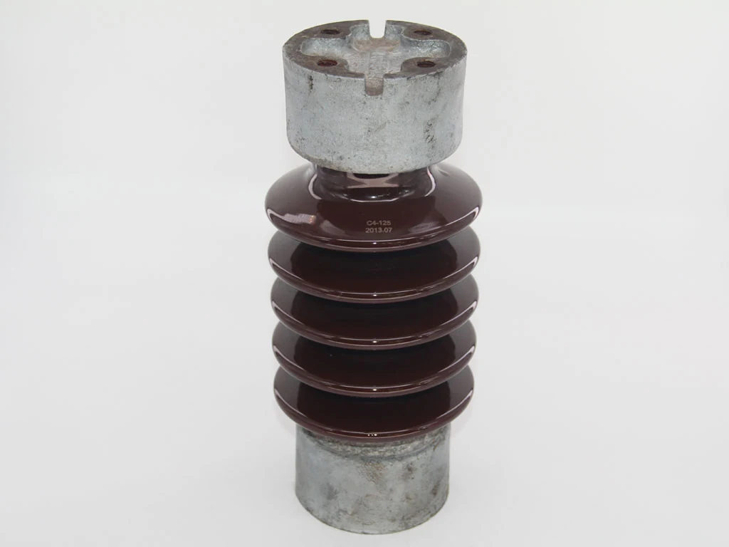Brown glazed porcelain station post insulator with ribbed sheds and cast