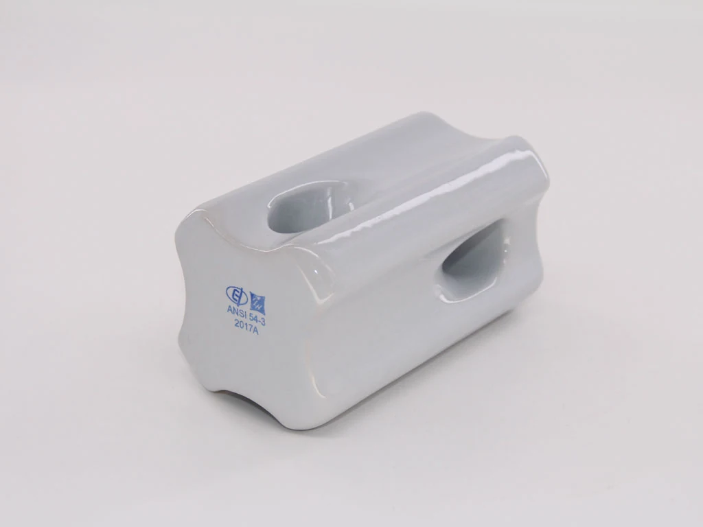 Glossy white glazed ceramic part with two through-h