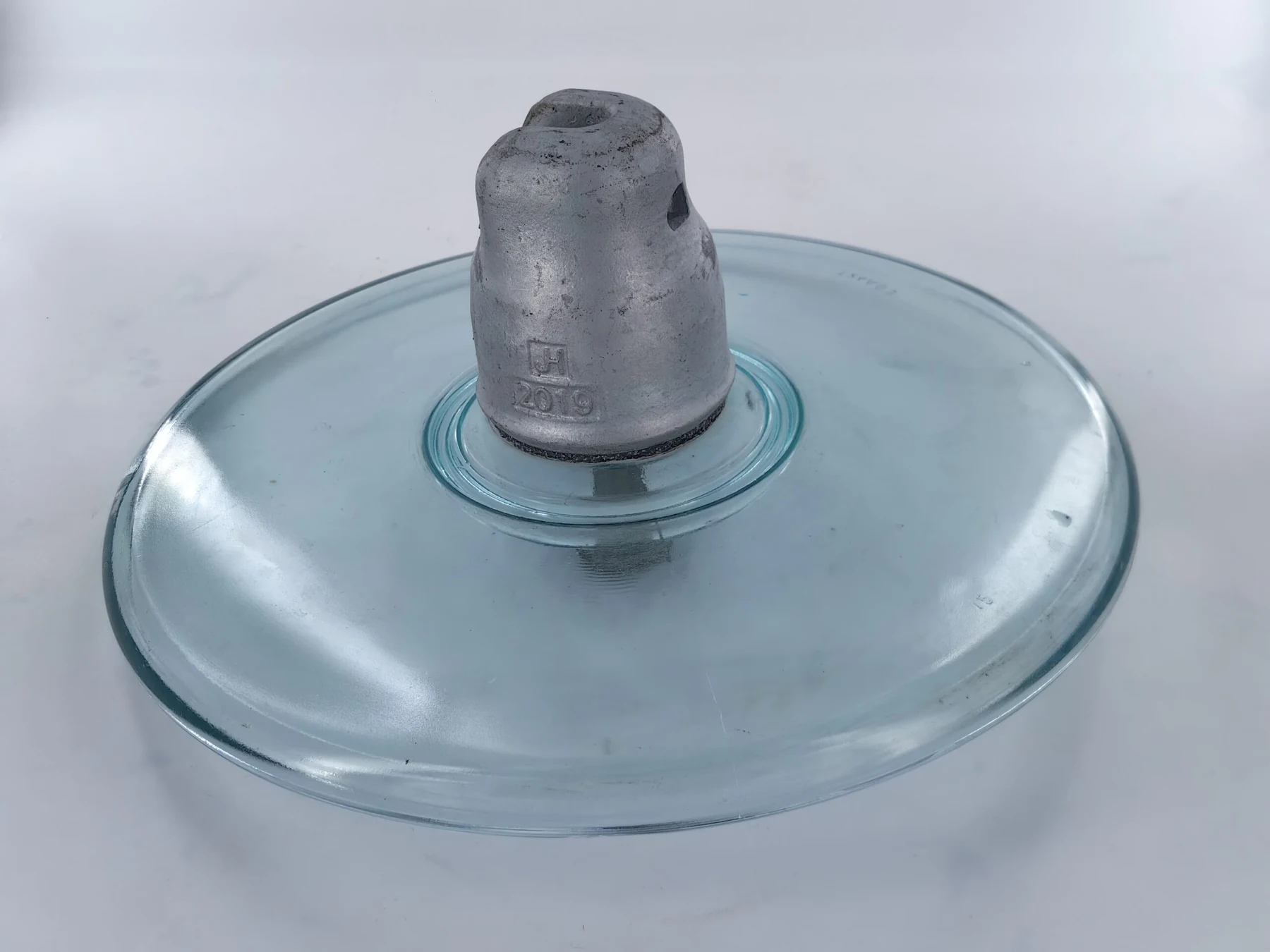 Aerodynamic type toughened glass insulator with open self-cleaning profile