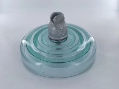 Fog type U120BP toughened glass insulator at 146 mm spacing
