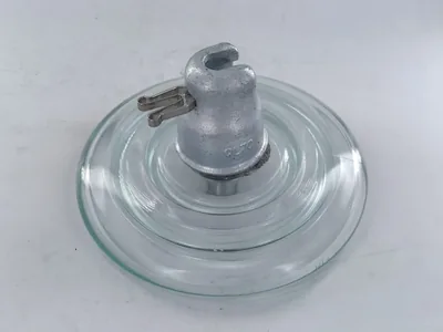 Standard type toughened glass suspension insulator used on overhead transmission line strings