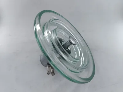 Toughened glass suspension insulator shell and galvanised cap