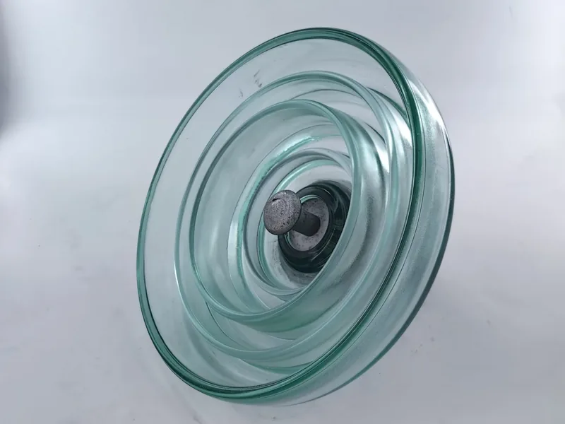 Fog type toughened glass insulator viewed from below showing deep anti-pollution sheds