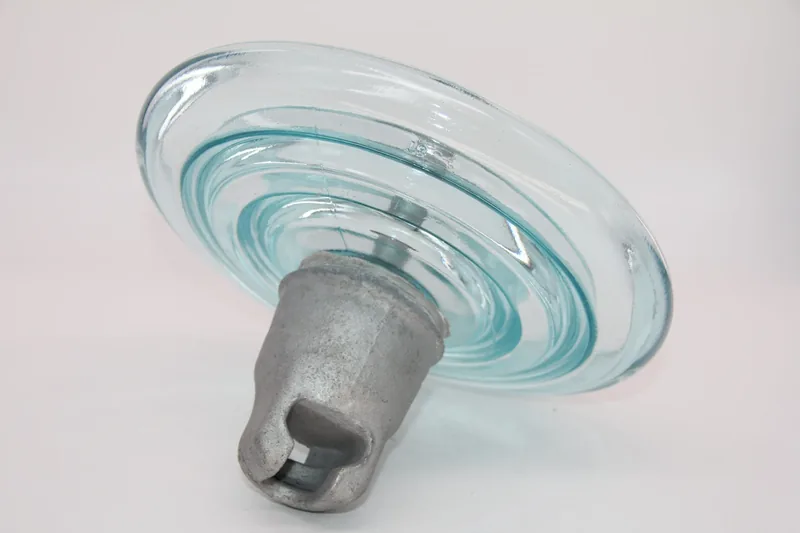Toughened glass insulator shell showing the compression-toughened surface