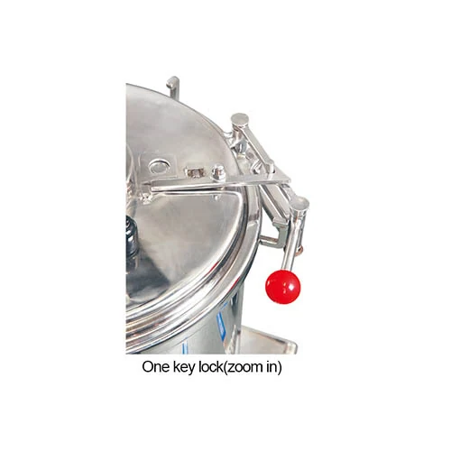 Detail view of the single-action sliding lock handle mechanism and safety valve assembly on the decoction pot