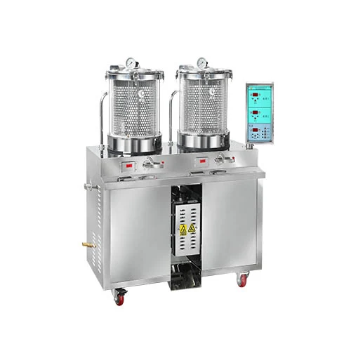 Huayan HVR2000 micro-pressure herb decoction and packing machine showing two glass pots and piezometer gauges