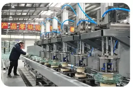 Automated pressing and tempering line for toughened glass insulator shells
