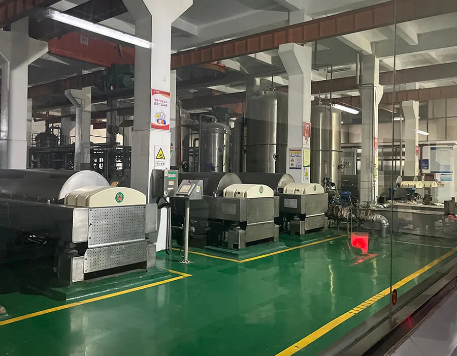 Production plant interior with reactors and process piping