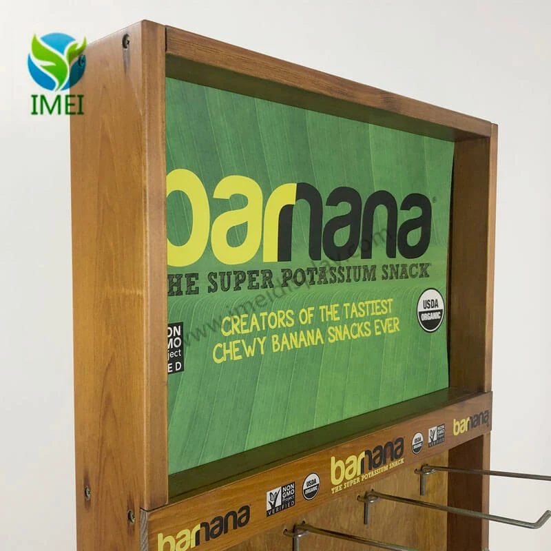 Side view of the banana store rack showing the metal hooks and printed top panel