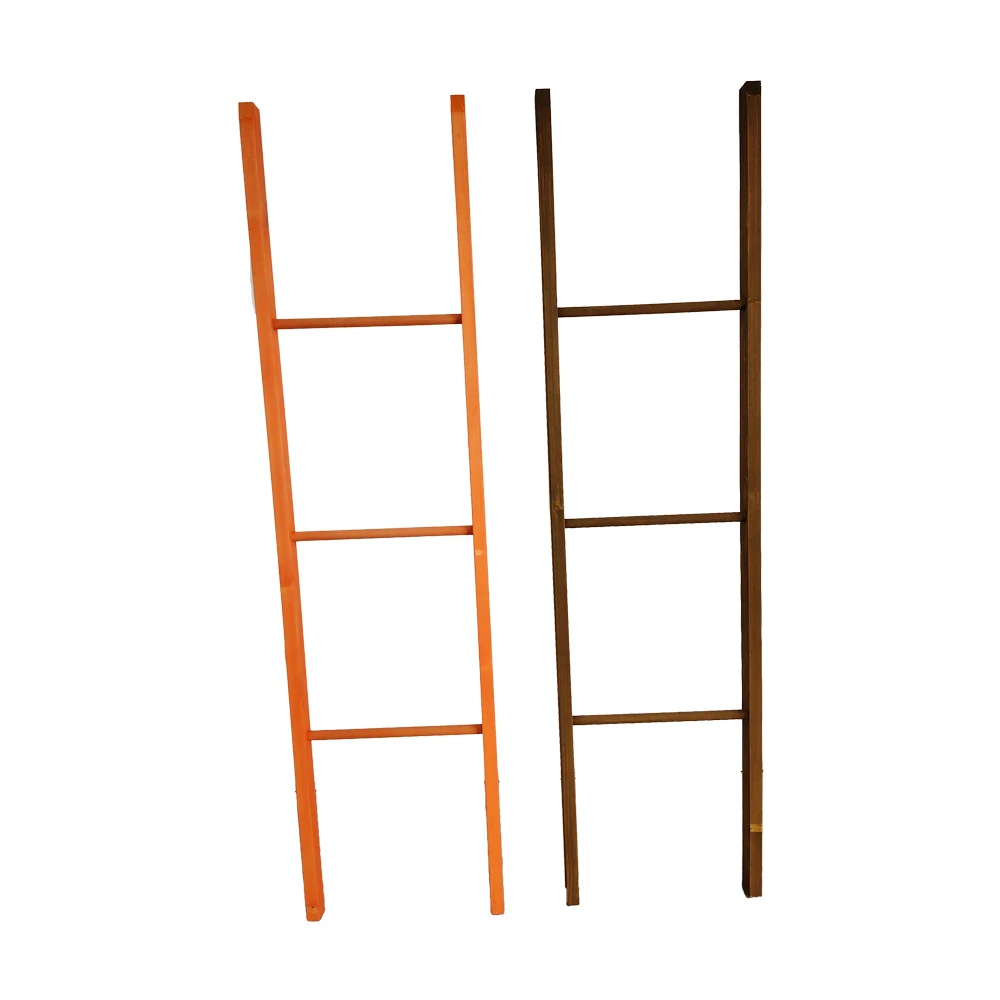 Simple clothes rack standing upright in a retail setting with garments on the bars