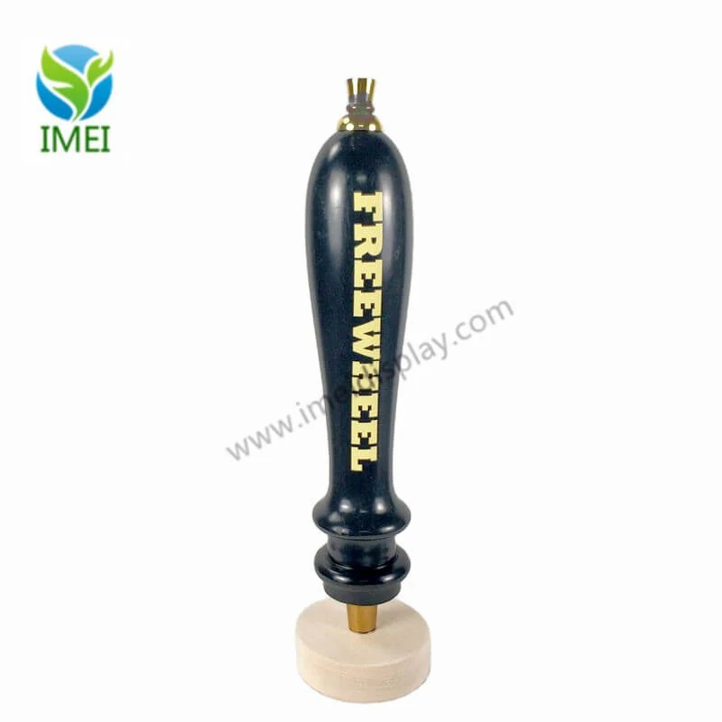 Wooden tap handle mounted on a beer tap in a bar setting