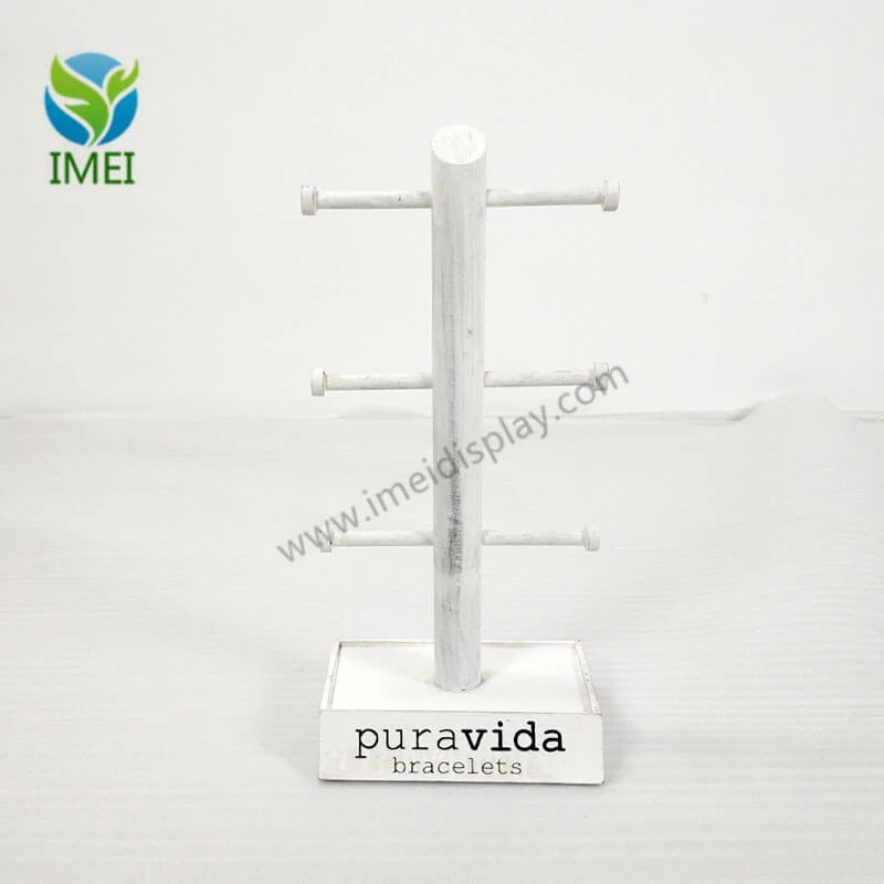 Metal and wood jewelry counter display shown from the side with secure tray compartments