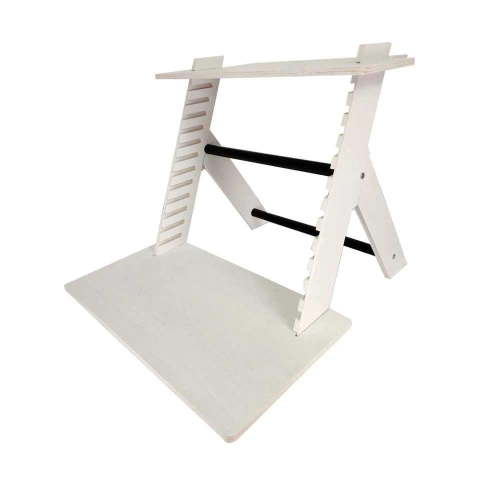 Corner shelving unit with open-frame design in a workshop setting