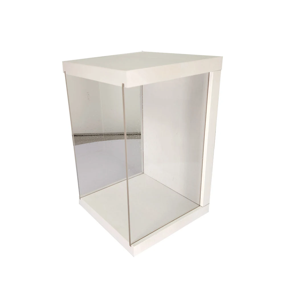Custom mixed-material retail rack standing upright in a workshop, showing wood, metal and acrylic components