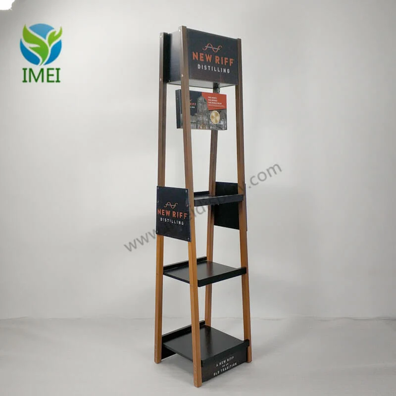 Wooden floor display with hanging signs standing upright in a workshop