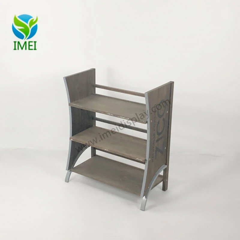 Three-tier floor display with an antiquated aesthetic standing upright in a workshop