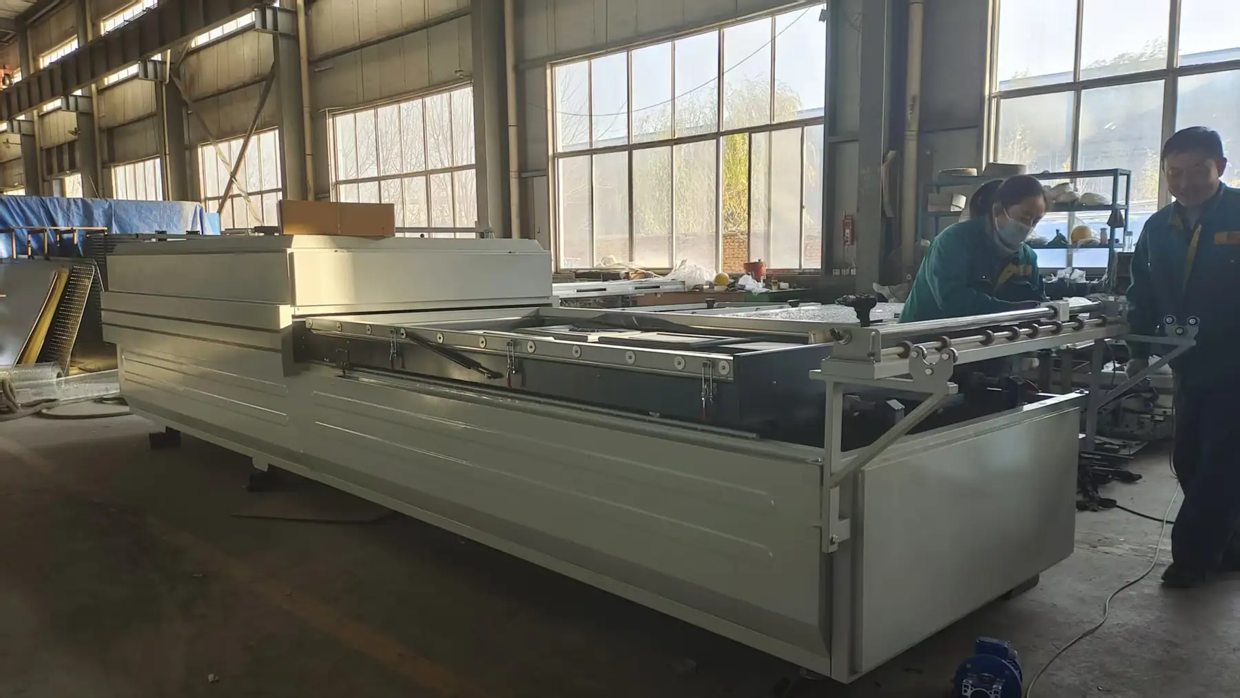 Vacuum Press Machine for Wood Doors & Cabinets Negative, feed section detail