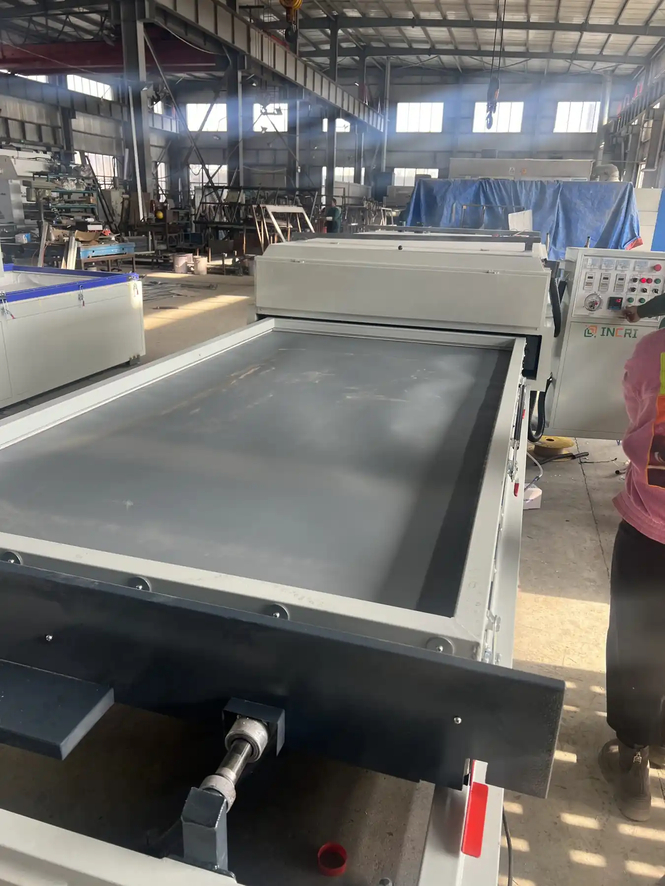 Vacuum Press Machine for Wood Doors & Cabinets Negative, front view on the assembly floor
