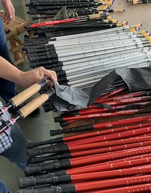 Finished poles being packed for export