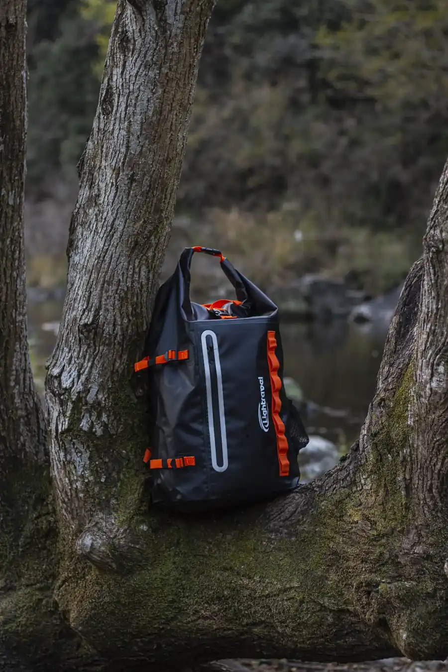 Waterproof Floating Backpack with Heavy Duty Roll-Top Closure and Exterior Zippered Pocket Dry Bag