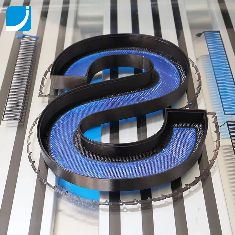 A channel letter being printed layer by layer on an Iroga 3D sign printer