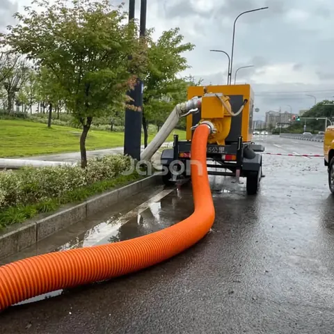 8 inch PVC suction hose coiled and strapped