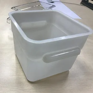 Large white molded container part with a molded-in handle