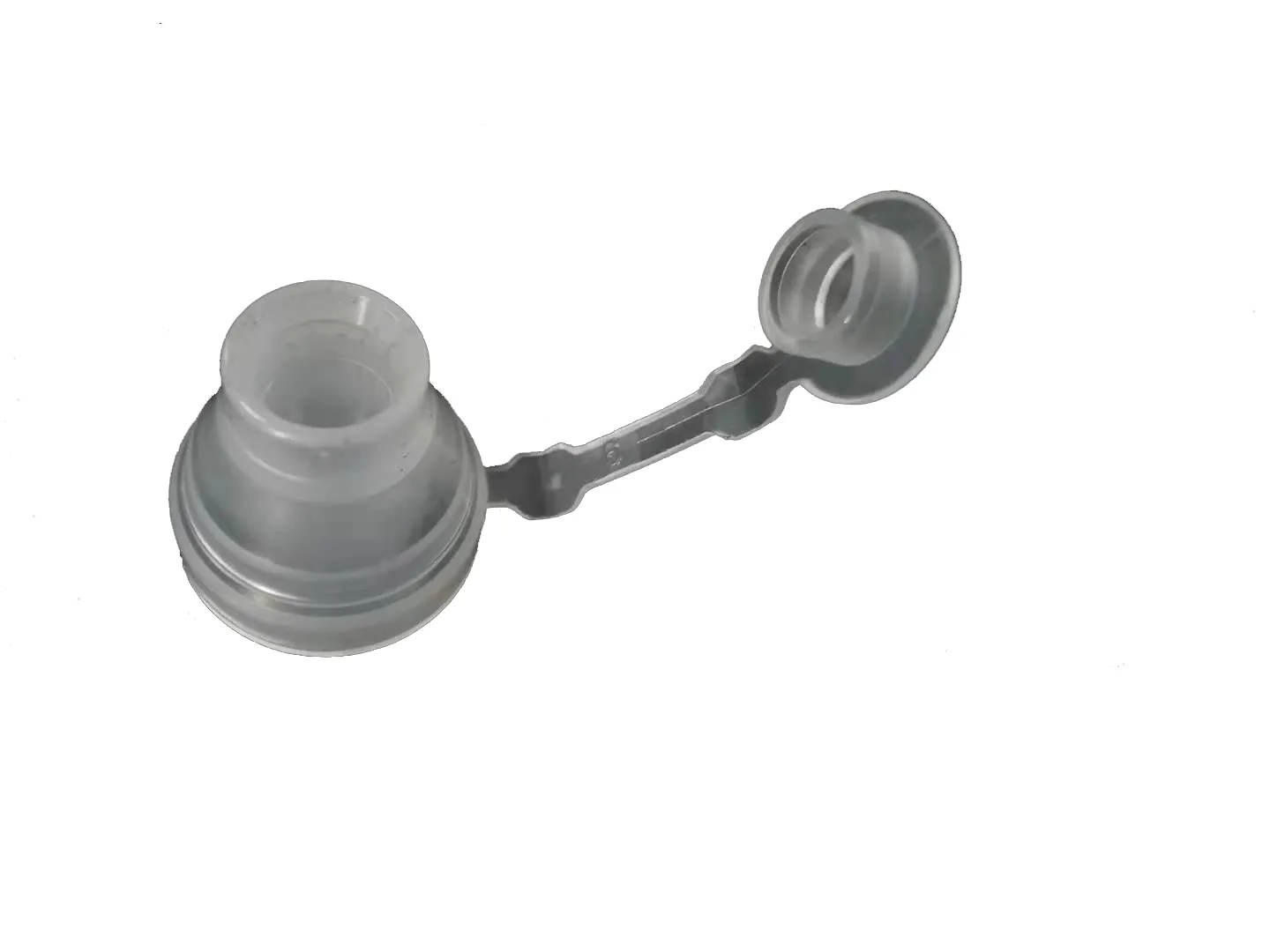 Medical Port Fitting with Tethered Cap
