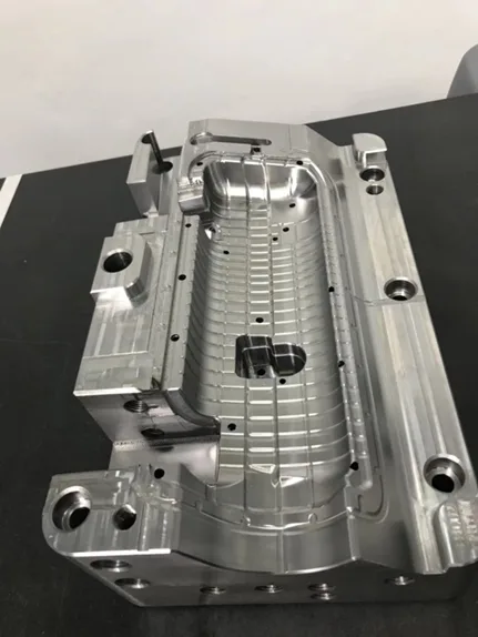 Machined mold insert block set up for inspection