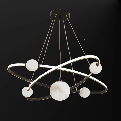A13 Planet alabaster pendant light photographed lit against a black background