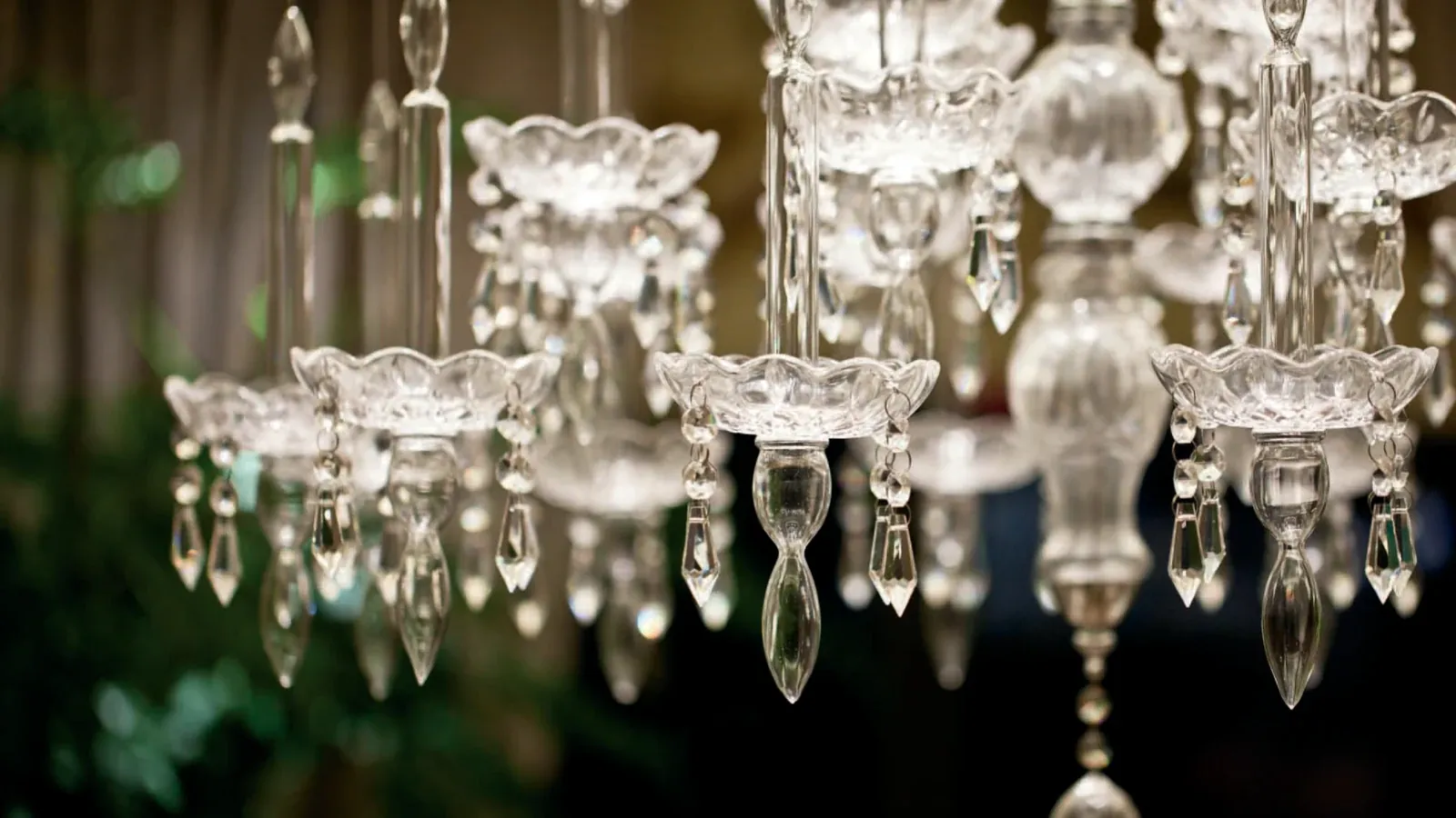 Clear crystal chandeliers with cut glass drops photographed close up