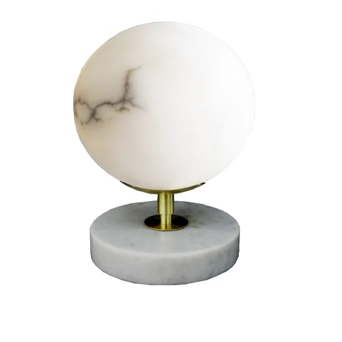 B06 Moon alabaster table lamp with a white marble base and a brushed brass finish