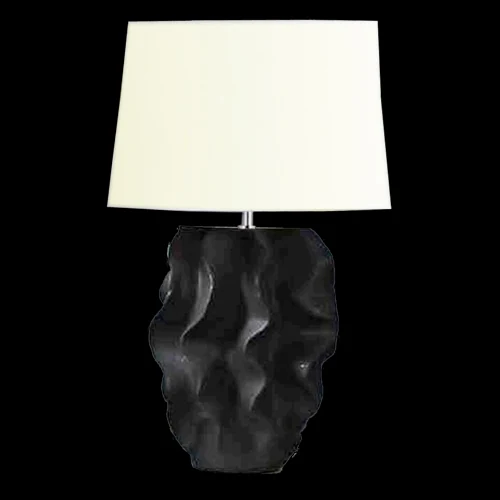 B10 Wave ceramic table light photographed lit against a black background