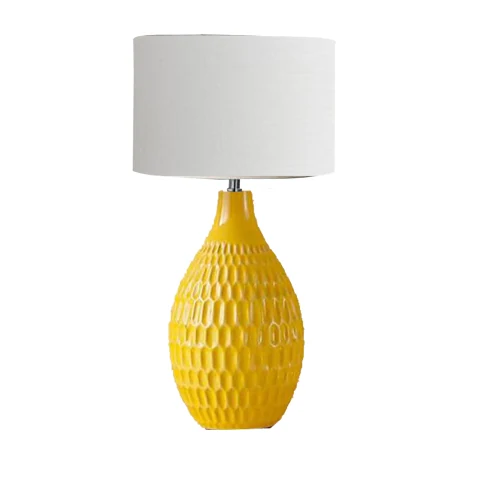 B11 Dimple Ceramic Table Light with a dimpled ceramic base and white linen shade