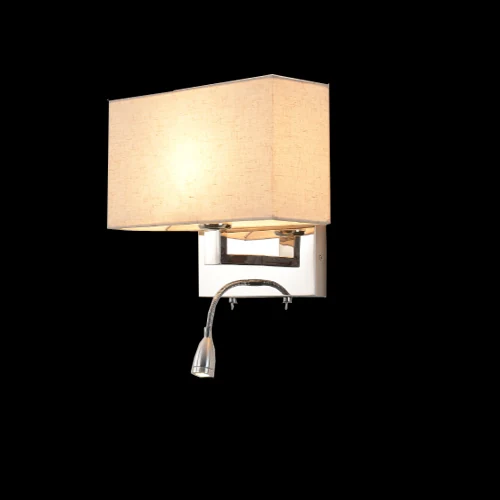 C07 Wall Sconce photographed lit against a black background