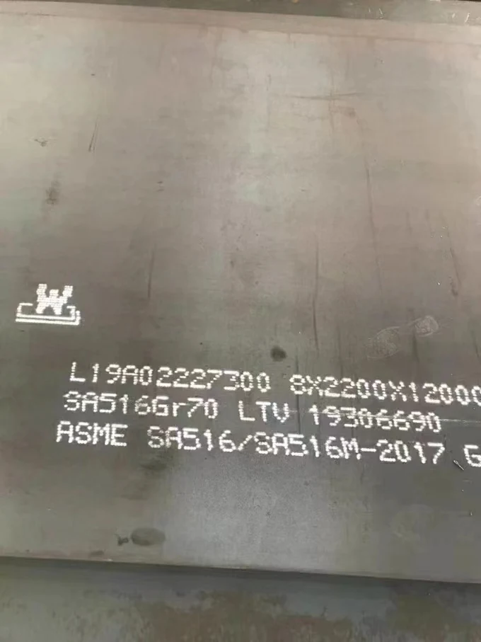Close-up of a steel plate with stenciled grade markings including SA516Gr70 and ASME SA516/SA516M-2017.